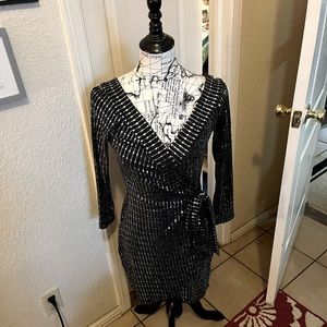Luxxel black and silver sequined dress. New with tags.